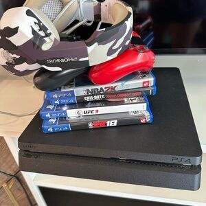 Sony PS4 Console with Red Controller and Camouflage Headset